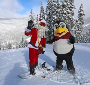santa and penguin pete on the slopes at diamond peak