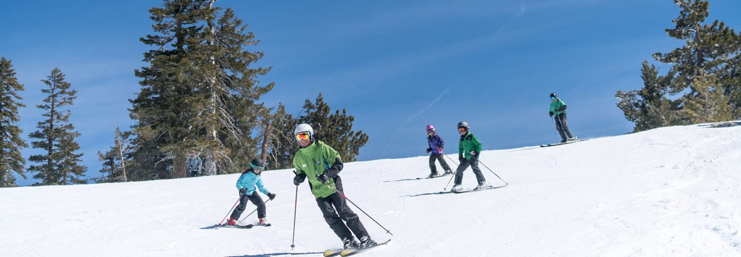 youth skiers with instructor at diamond peak