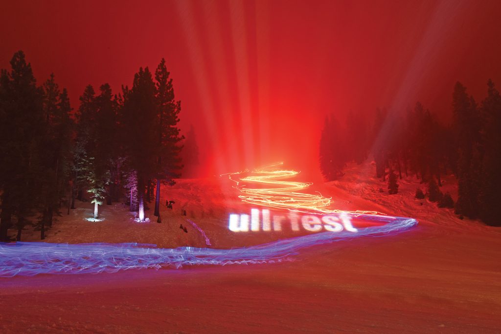 ullr fest torchlight parade on the slopes of diamond peak at night