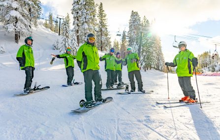 diamond peak employee ski and snowboard instructors in a group