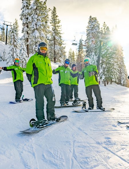 diamond peak employee ski and snowboard instructors in a group