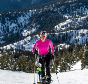 woman splitboards up diamond peak in luggi race