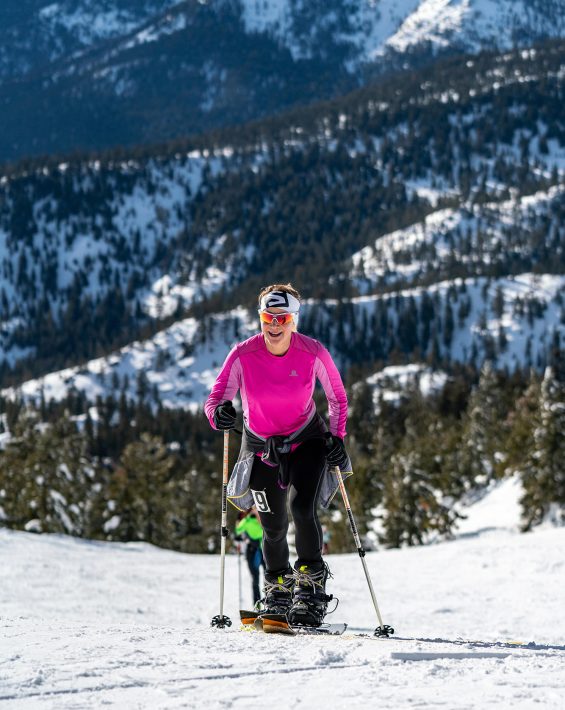 woman splitboards up diamond peak in luggi race