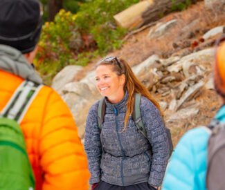 Naturalist talks on snowshoe hike
