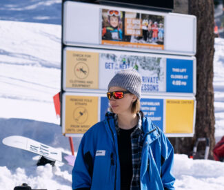 female lift operator with sunglasses at diamond peak ski resort
