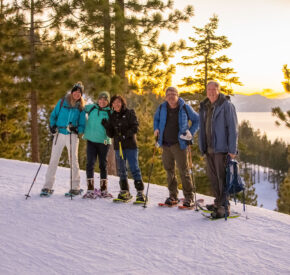 group snowshoe hikes during sunset at diamond peak