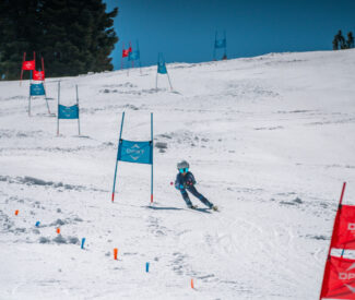 girl on ski race course at diamond peak ski resort