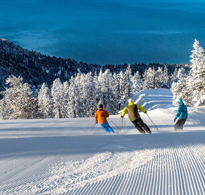 crystal ridge groomer skiing with lake tahoe views