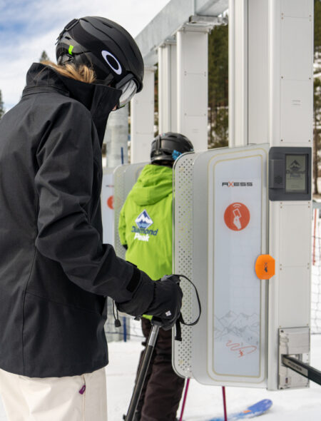 woman goes through RFID gate