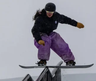 Never summer snowboarder on rail