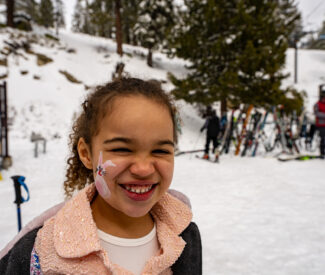 girl with Easter bunny face paint at Diamond Peak Ski