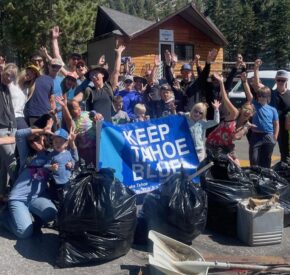 group with keep tahoe blue banner
