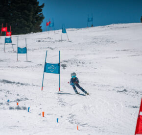 girl on ski race course at diamond peak ski resort