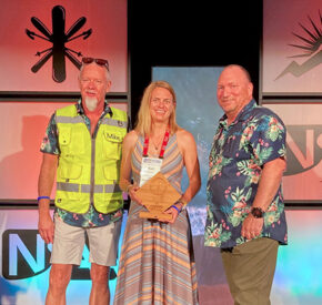 Kari Brandt accepting her Safety Champion award from NSAA