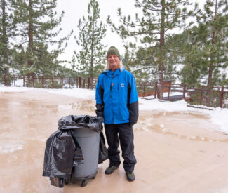property ops man with trash can
