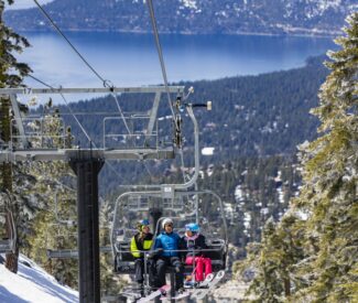 group of skiers on crystal express chairlift at Diamond Peak