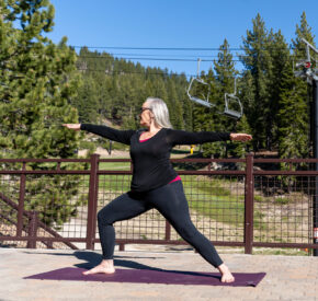 woman does yoga at diamond peak